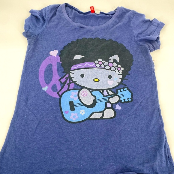 Pre-Owned Hello Kitty by Sanrio "Peace Love Huppyness" Purple T-Shirt – Size 6 - Picture 1 of 5